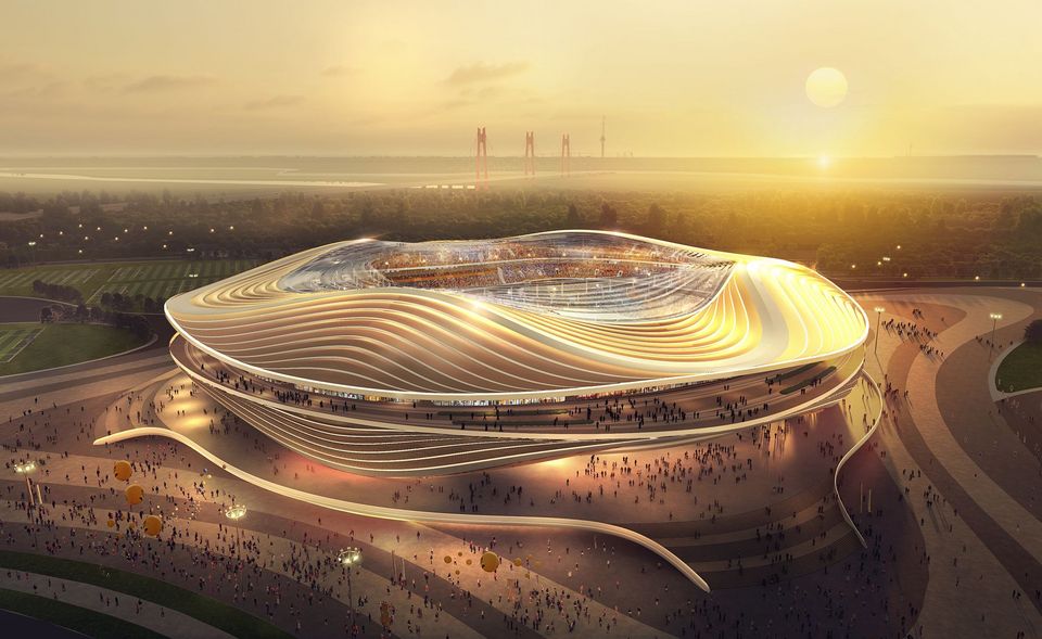 Exterior rendering of an arena with a layered roof form and a large plaza in a landscaped setting.